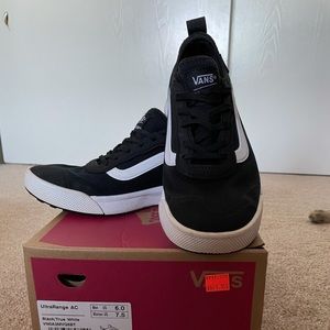 Black and white UltraRange AC vans